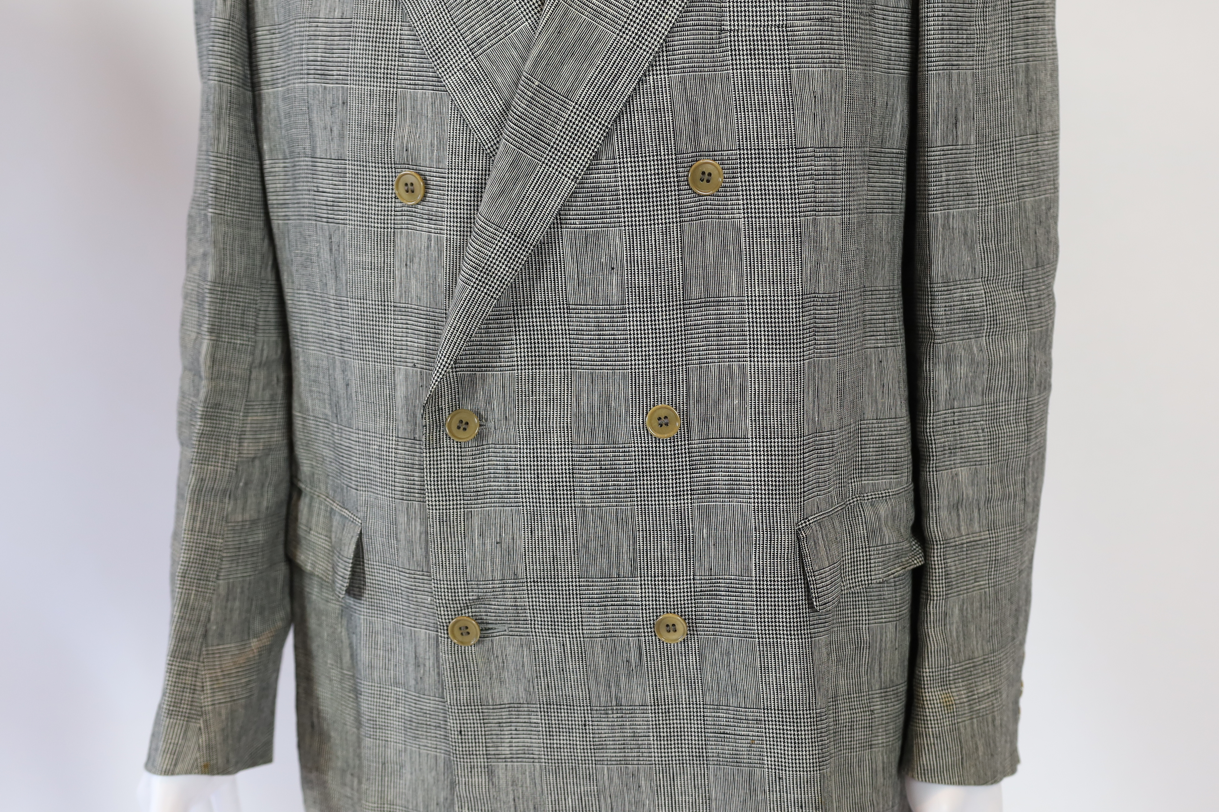 A Saint Laurent rive gauche gentlemen's Prince of Wales check double breasted linen suit, approx size 42
